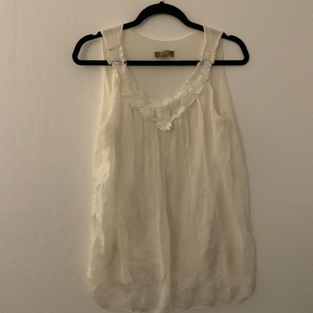 Carla Conti white top with flowy crepe fabric